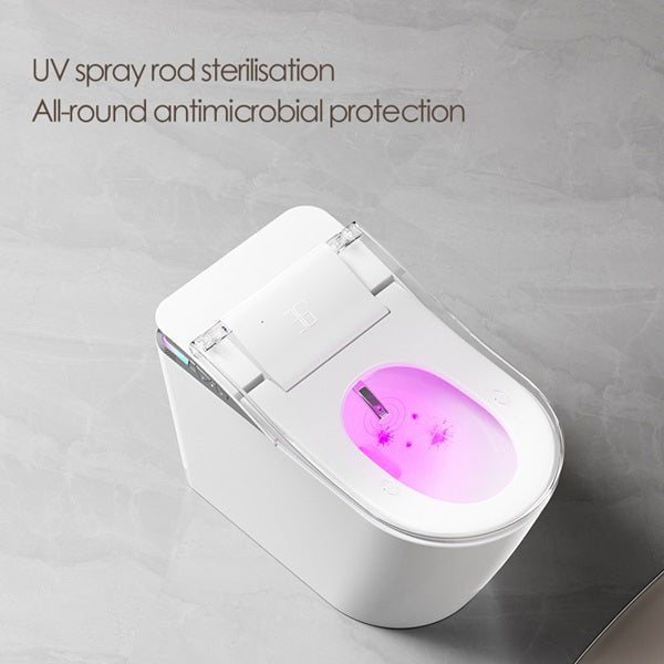 White toilet bowl with UV light feature on a gray background