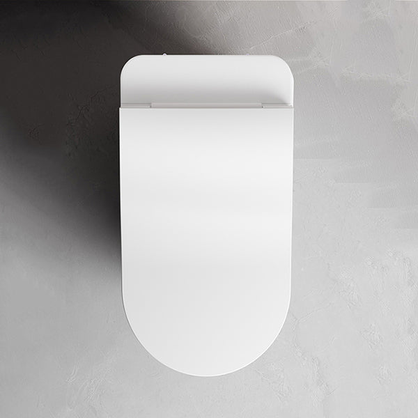 White wall-mounted light fixture on a gray wall