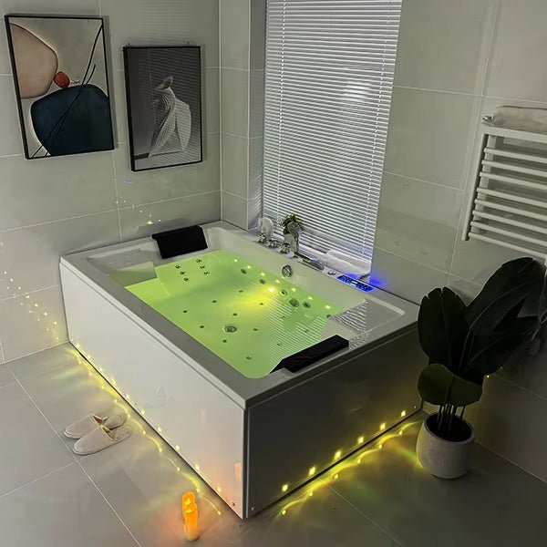 Top view of Cascada LED massage bathtub showing dual headrests and 21 jet layout