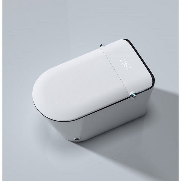 White electronic device with a digital display on a light gray background