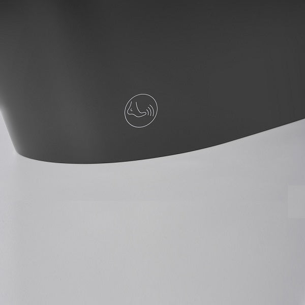 Touchless foot sensor at base of matte gray smart toilet for hands-free auto flush activation control