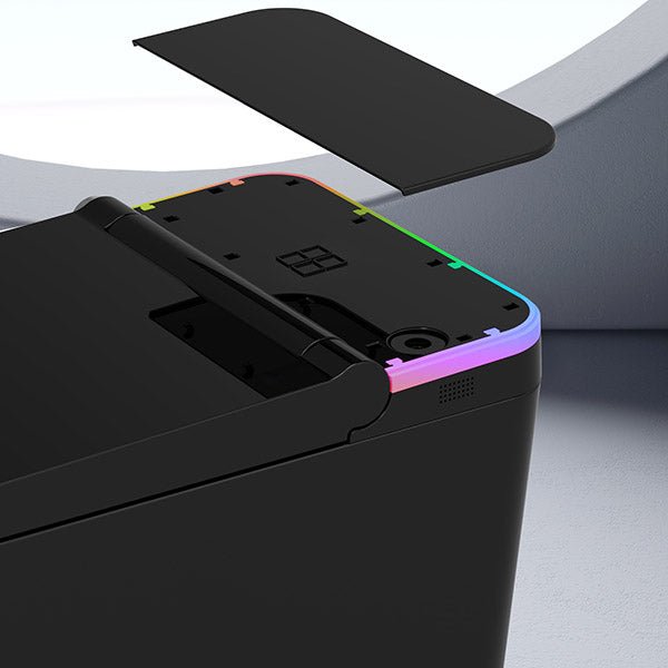 Black electronic device with RGB lighting on a gray background