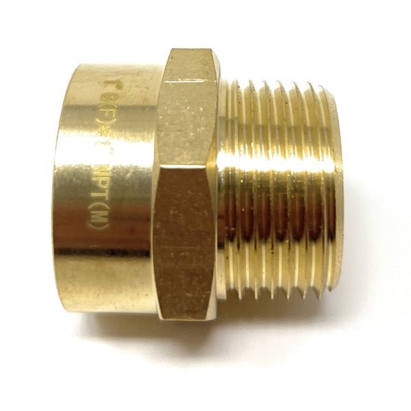 Brass pipe fitting on a white background