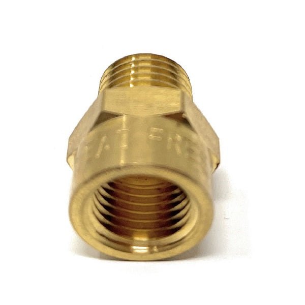 Brass plumbing fitting on a white background