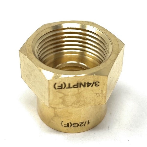 Brass hex nut with thread designations on a white background