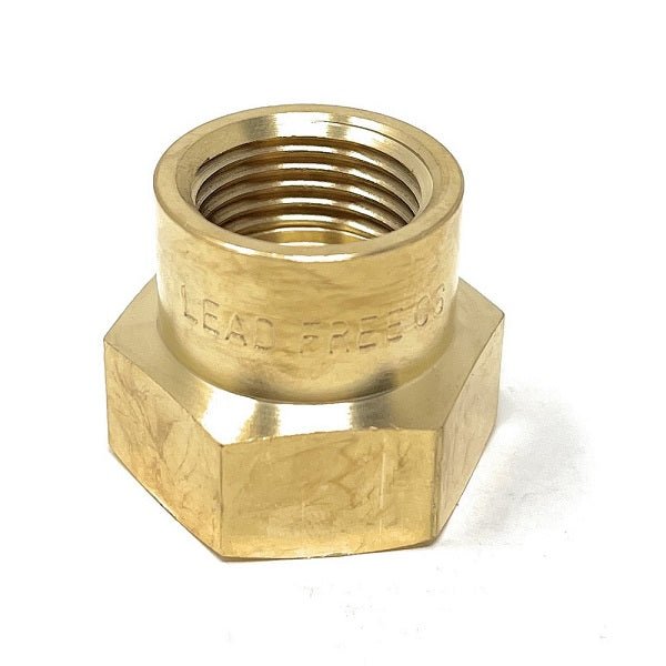 Brass hex nut with 'LEAD FREE' marking on a white background