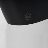 One-piece smart toilet with elongated ceramic bowl and matte black finish close-up