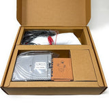 Open cardboard box containing electronic components Touchless SmartFlow automatic sensor faucet