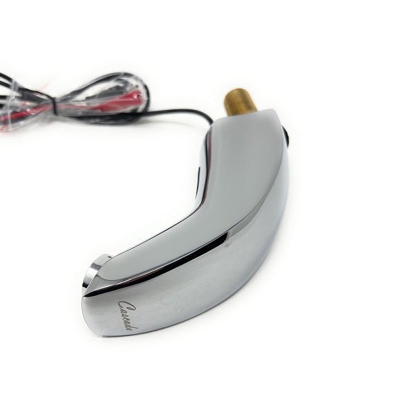 Chrome shower head with an electrical cord on an EcoMotion sensor faucet